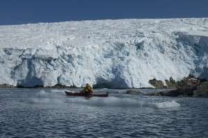 Iceberg-and-kayaker-300x199