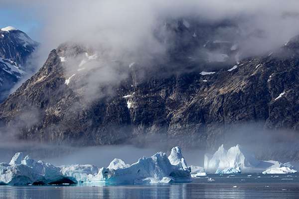 Greenland mountains and icebergs