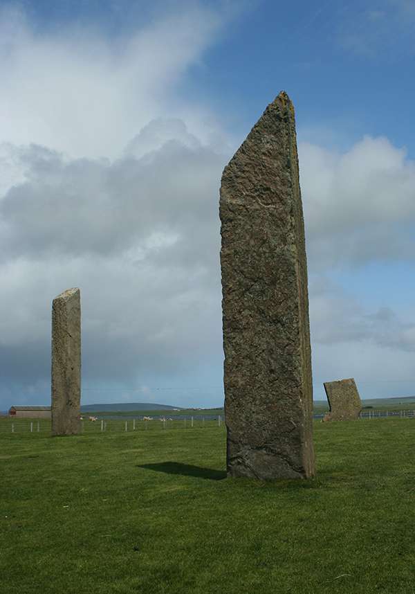 Standing 19 feet tall, the megaliths that make up the Stones of Stenness can be seen for miles around. ©Candice Gaukel Andrews