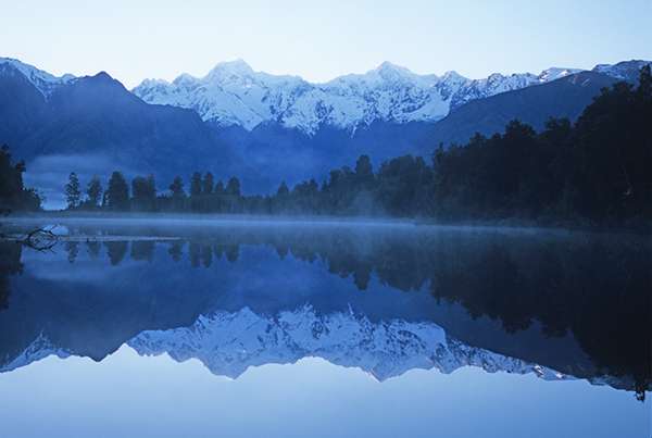 Visit New Zealand’s South Island, and you’ll be met by impossibly blue fiords, lofty snow-covered mountains and touchable glaciers. ©Mark Hickey