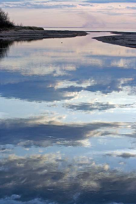 Watching clouds—and cloud reflections—may become popular again. ©John T. Andrews