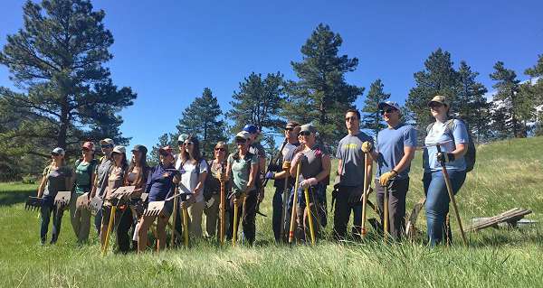 Natural Habitat Adventures volunteers building a new trail