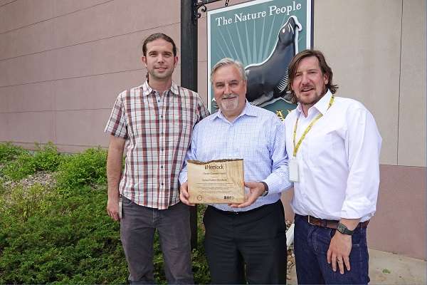 Natural Habitat Adventures accepts the Climate Champion Award