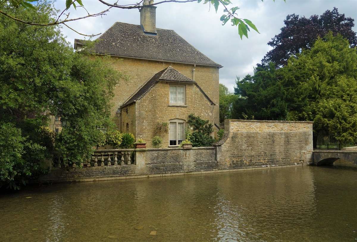 A house on the water in the Cotswolds, England. 