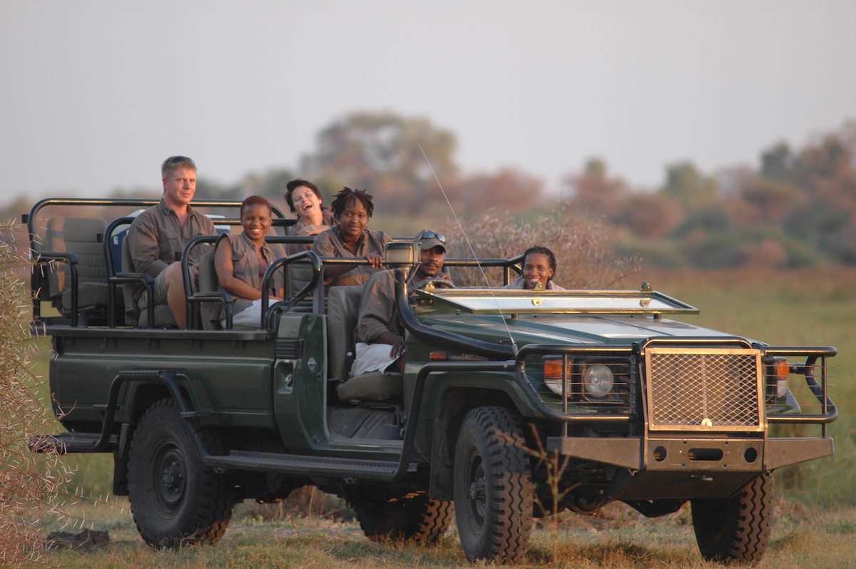 Travelers in Botswana on safari. 