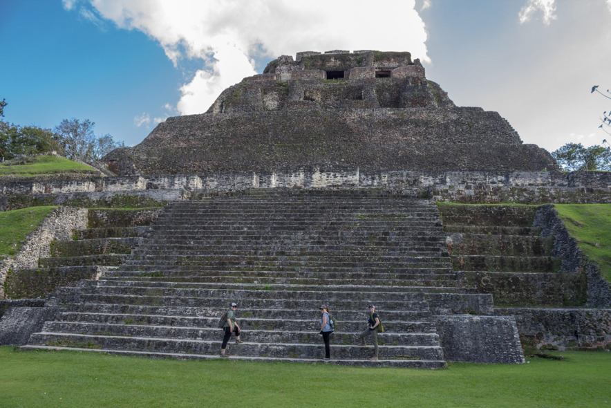 Two travelers and me beginning the climb up the ancient steps to Xunantunich El Castillo temple. 