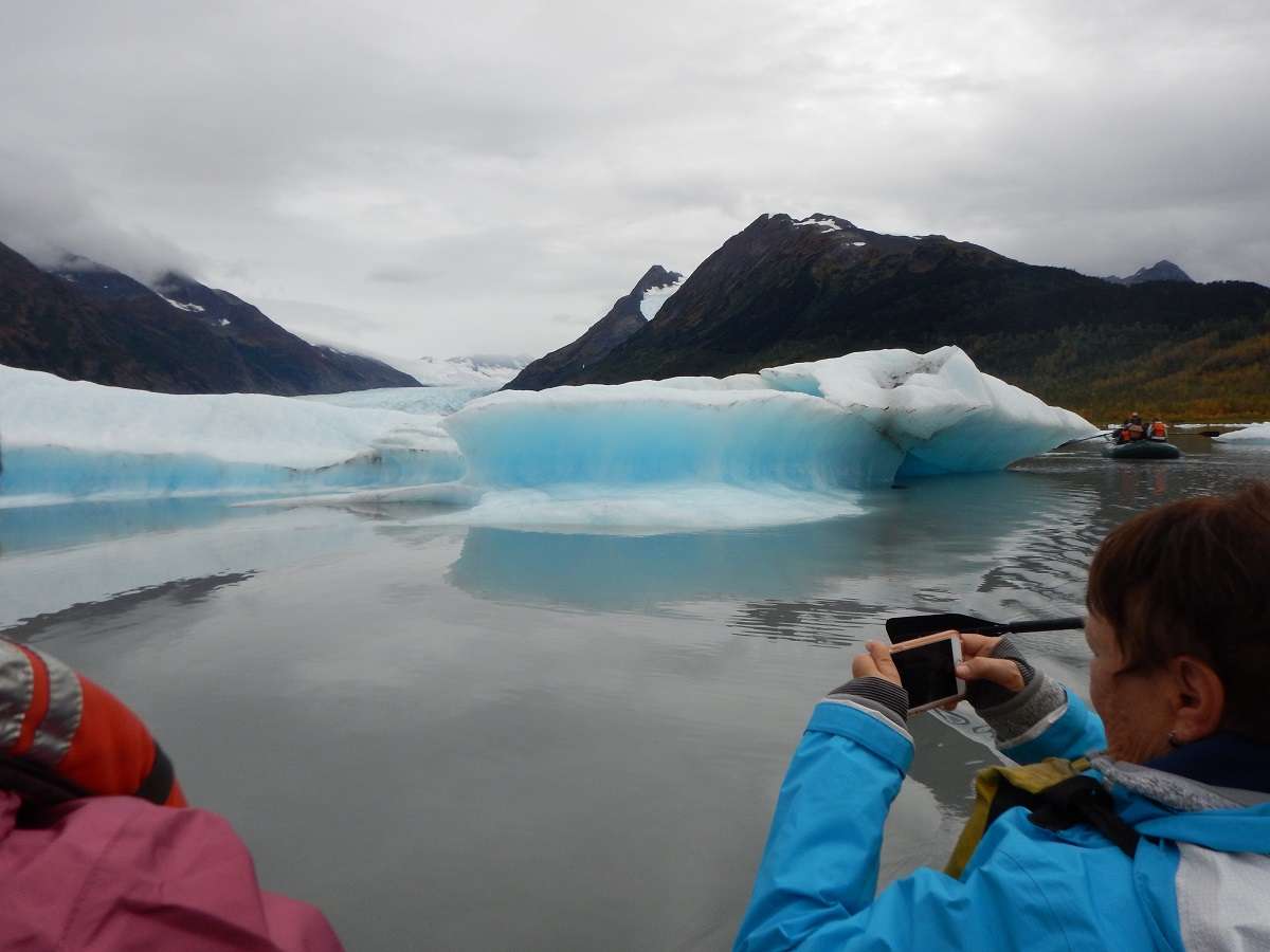 Nat Hab travelers photograph glaciers in Alaska. 