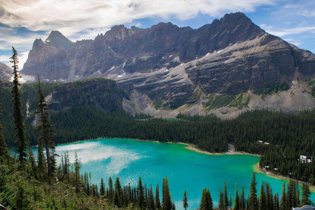 Towering mountains rise above turquoise lakes in Yoho National Park. 