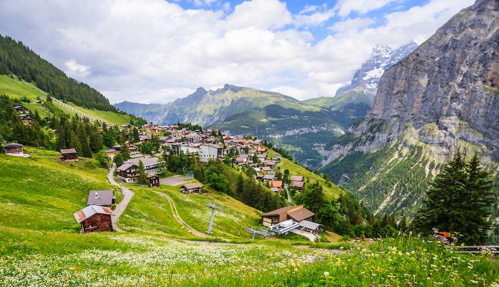 Take a cable car to reach the pedestrian village of Murren, perched atop a sheer cliff above a waterfall-filled valley.