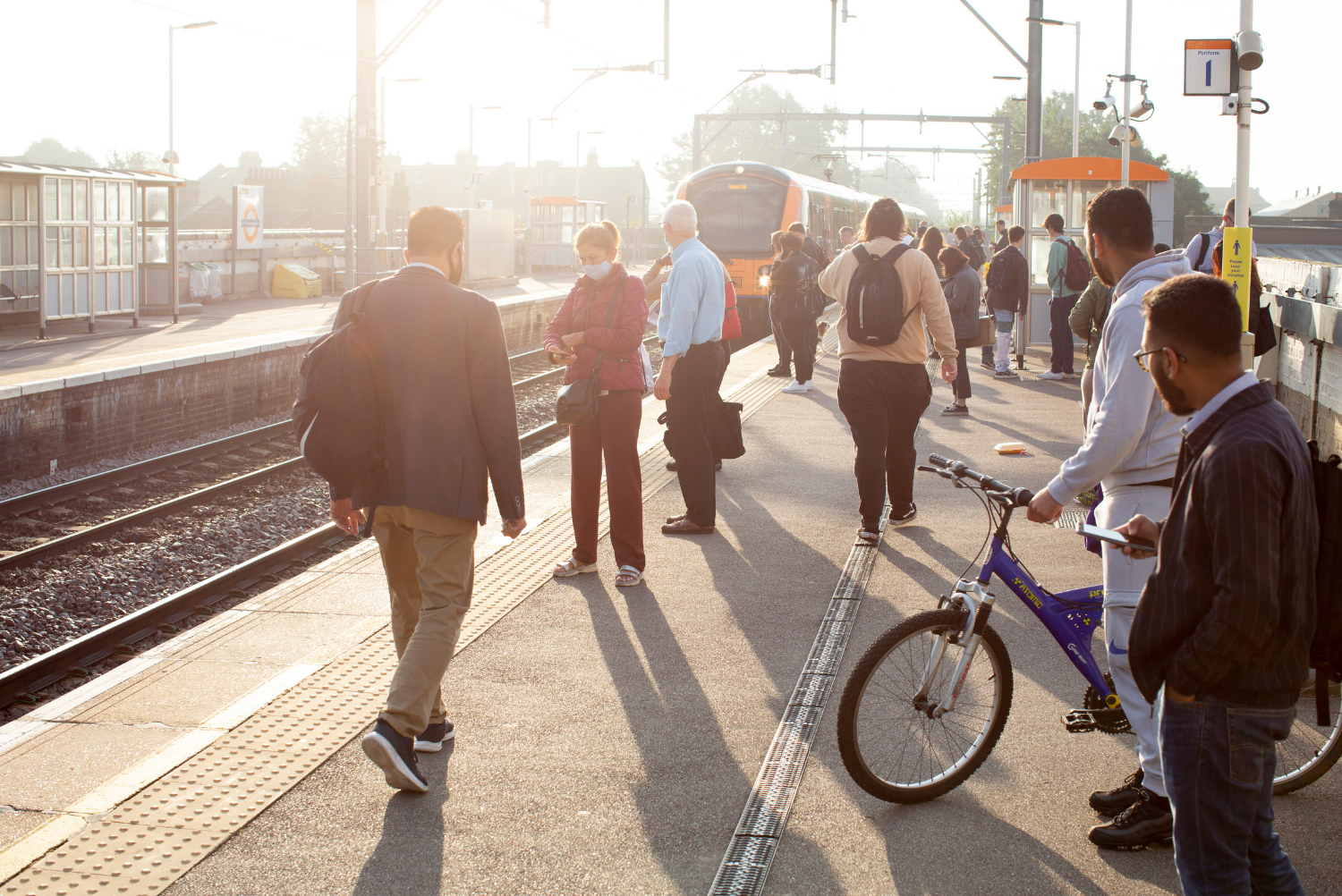 People commuting by public transportation, trains, bikes, walking