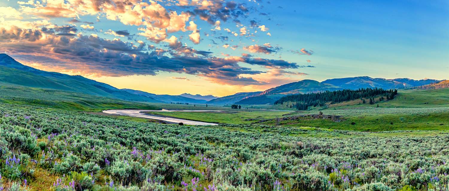 The sun rises over the Lamar Valley near the northeast entrance of Yellowstone National Park in Wyoming.
