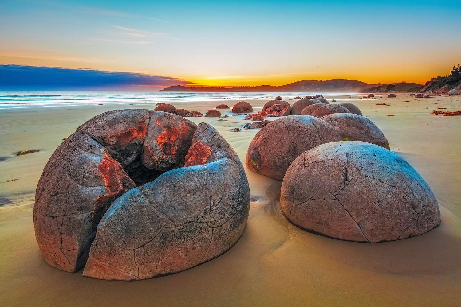Unreal Moeraki Boulders at sunrise, Koekohe beach, Otago, South Island, New Zealand