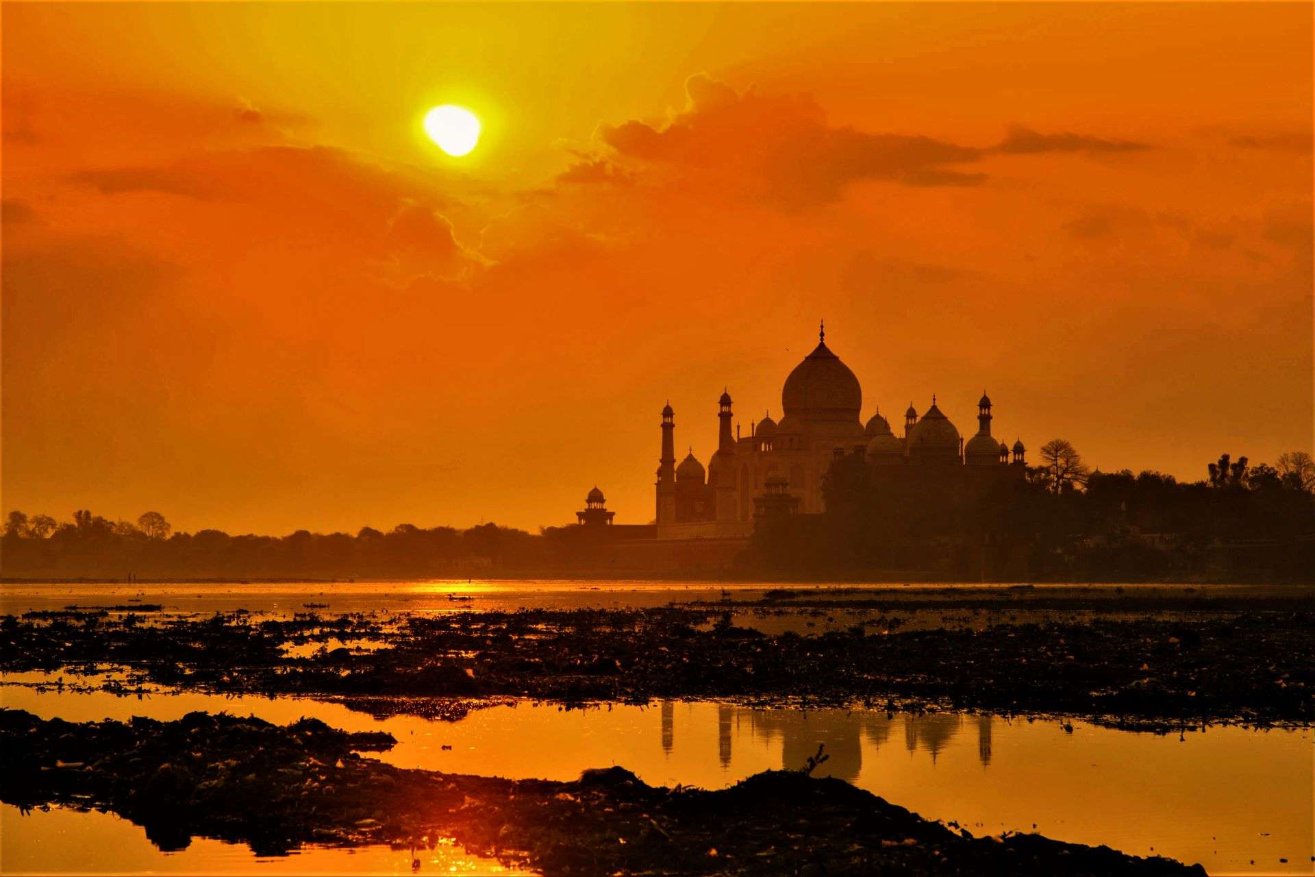A bright sunset of the Taj Mahal
