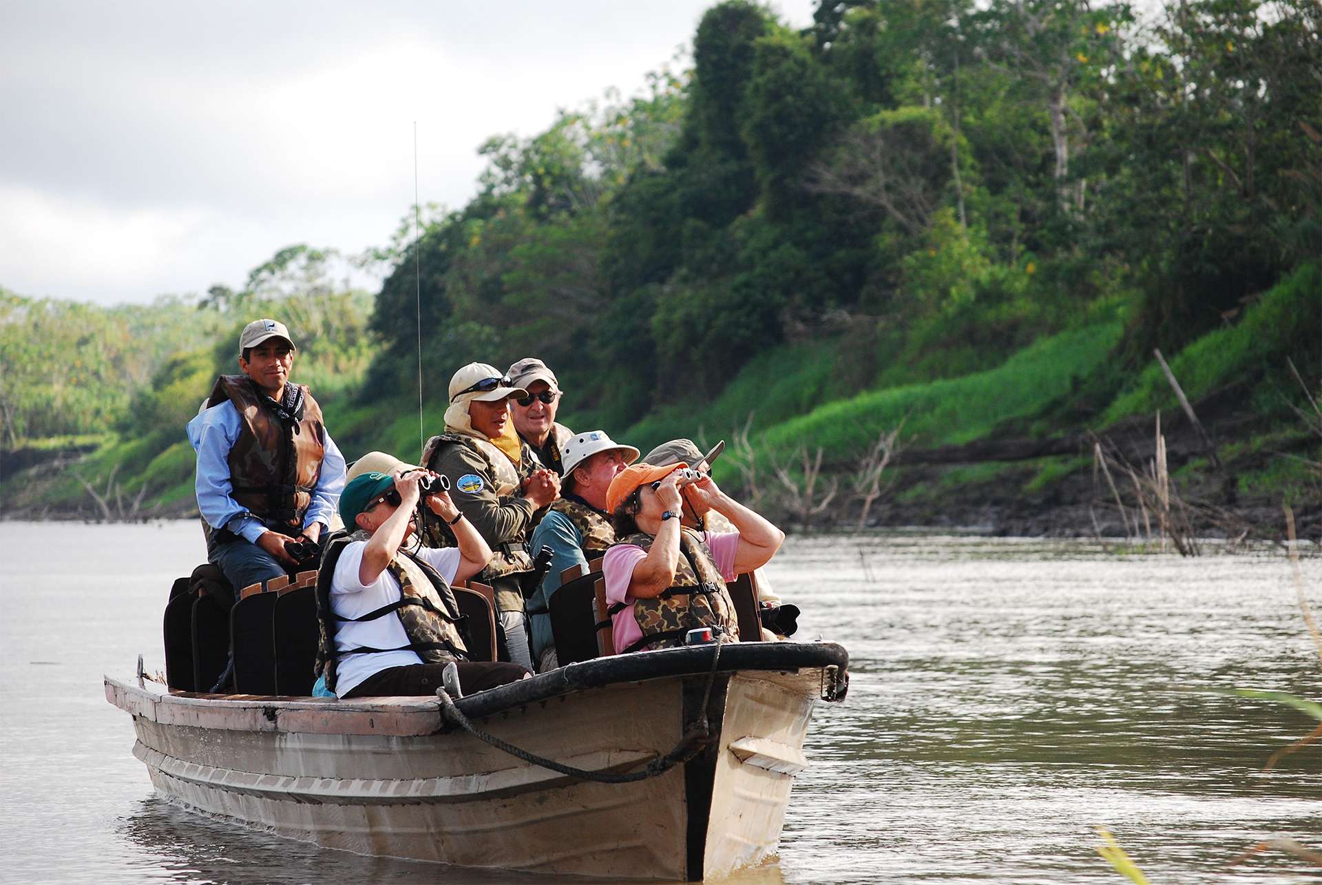 Amazon river cruise boat travel let’s camera bird watching binoculars