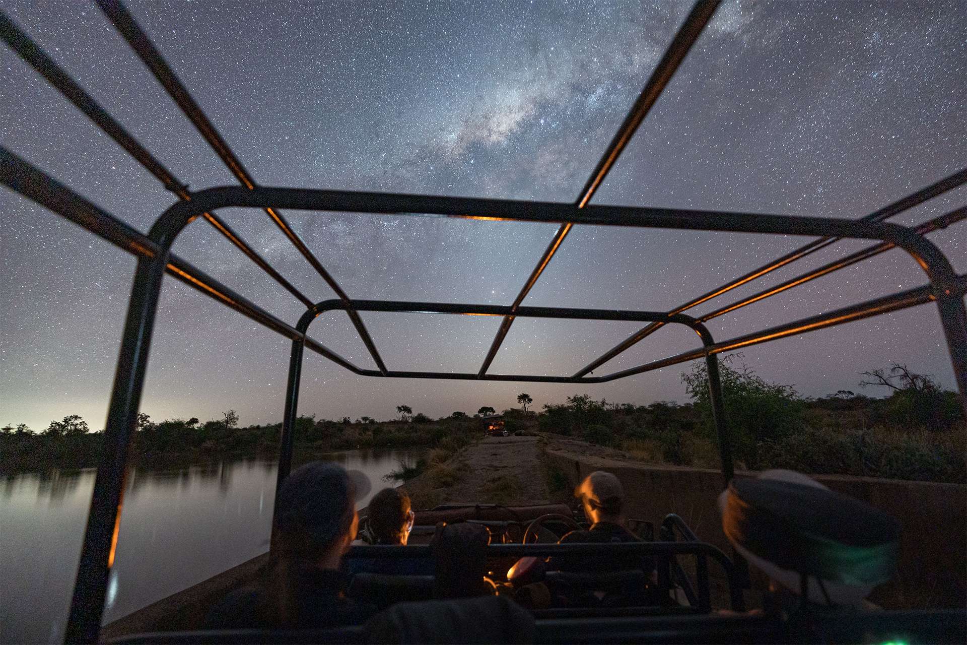 nighttime safari ride under the Milky Way night sky South Africa mala mala game reserve