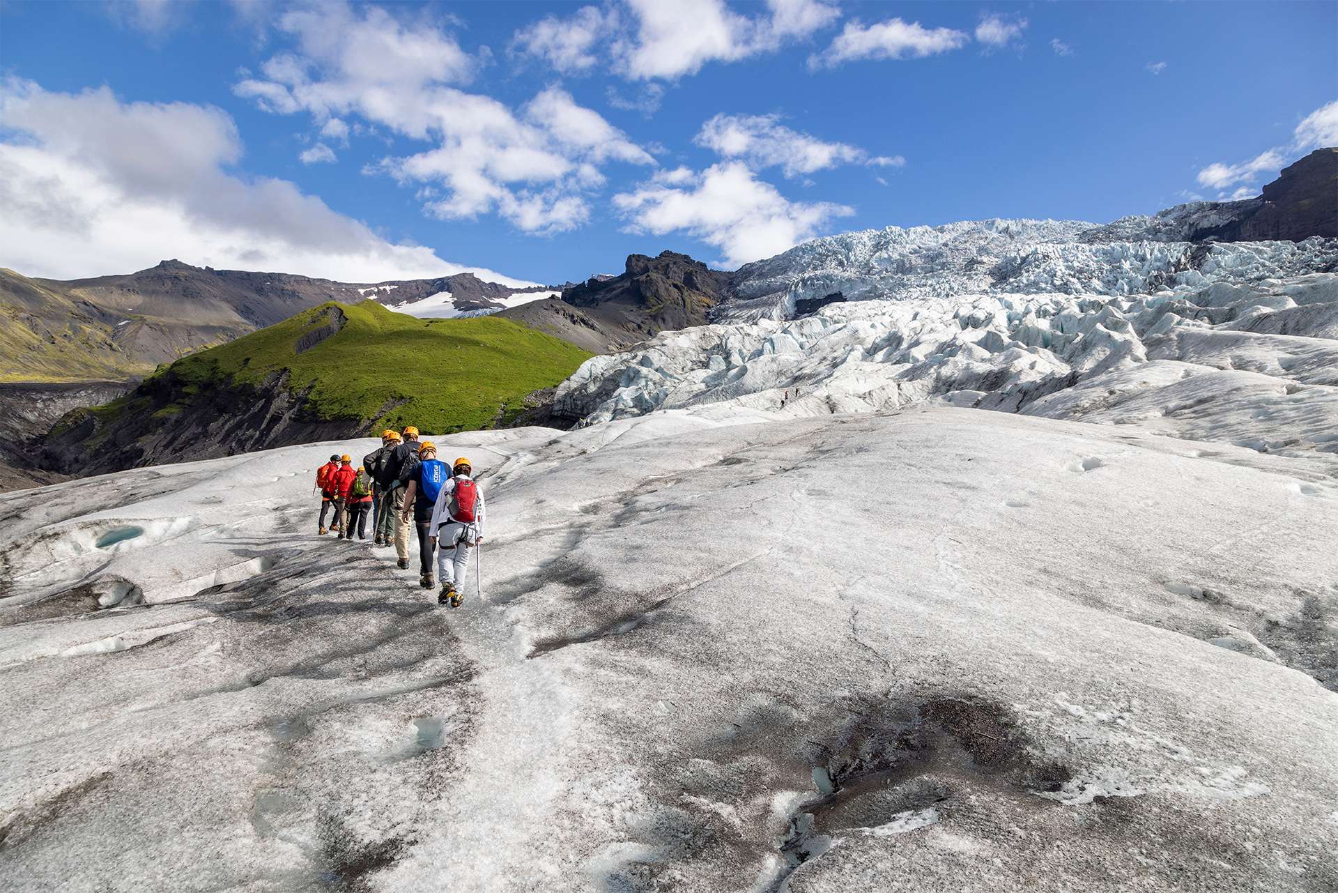 Nat Hab & WWF travelers traverse Glacier accessible via private helicopter landing 