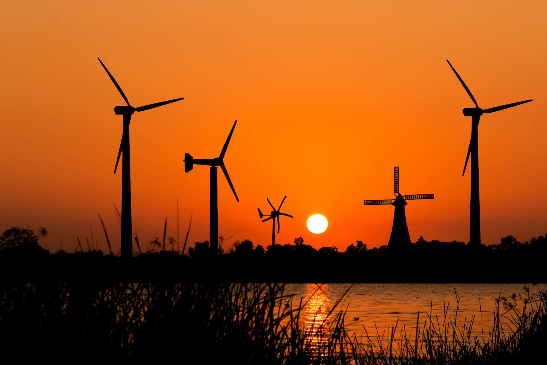 Wind turbines at sunset