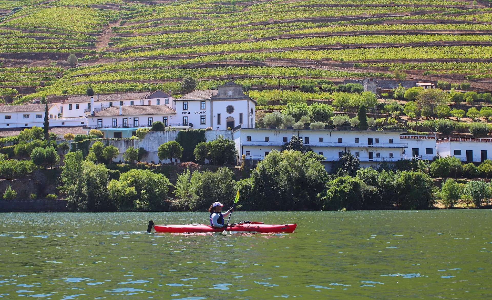 Woman kayaking on the Douro River in Portugal