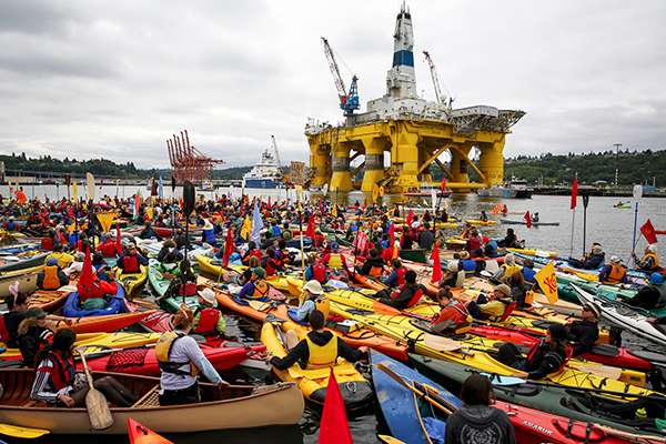 There some things worth fighting for together. On May 16, 2015, “kayaktivists” protested Royal Dutch Shell’s plan to drill for oil in the Arctic Ocean. ©Daniella Beccaria, flickr
