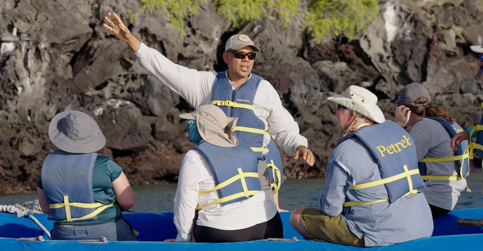 Nat Hab guests and guide on a panga ride, Galapagos Islands, Ecuador.