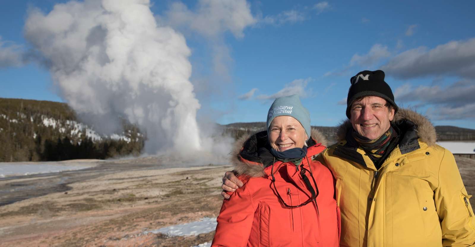 Nat Hab guests and geyser, Yellowstone National Park, Wyoming.