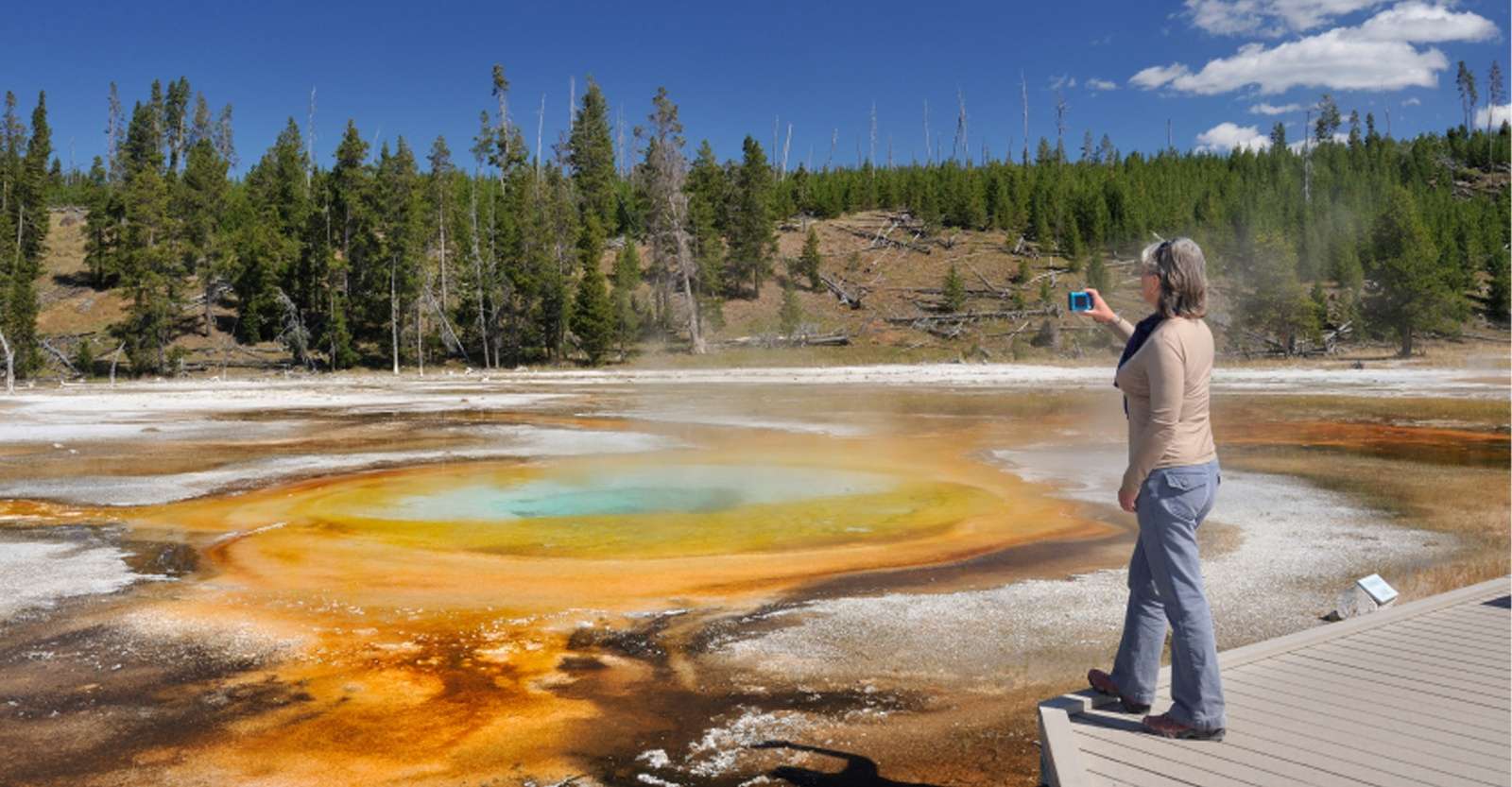 Guest and hot spring, Yellowstone National Park, Wyoming.