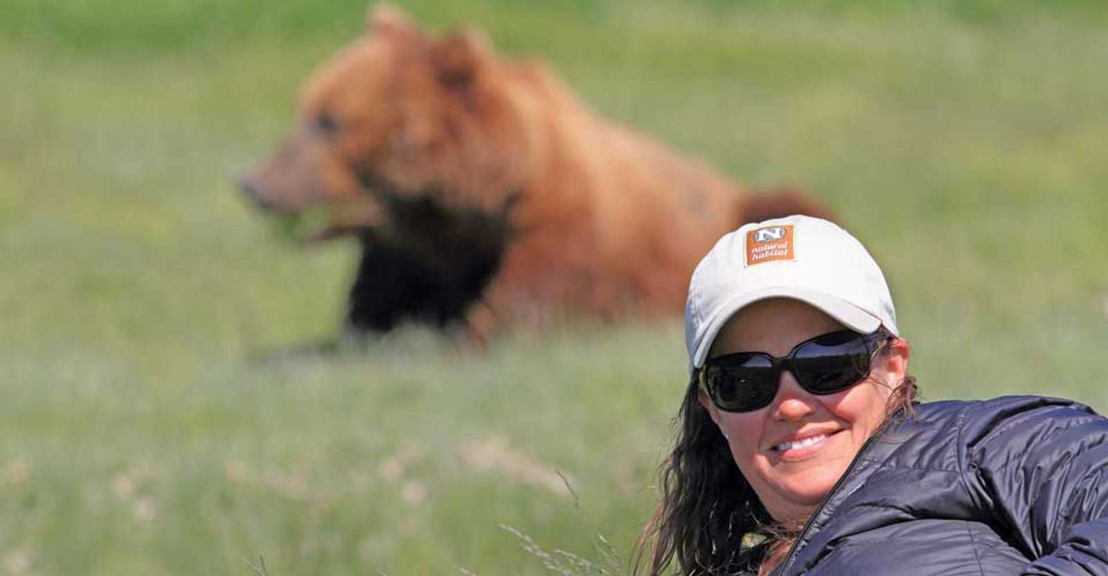 Nat Hab guest and brown bear, Katmai National Park & Preserve, Alaska.